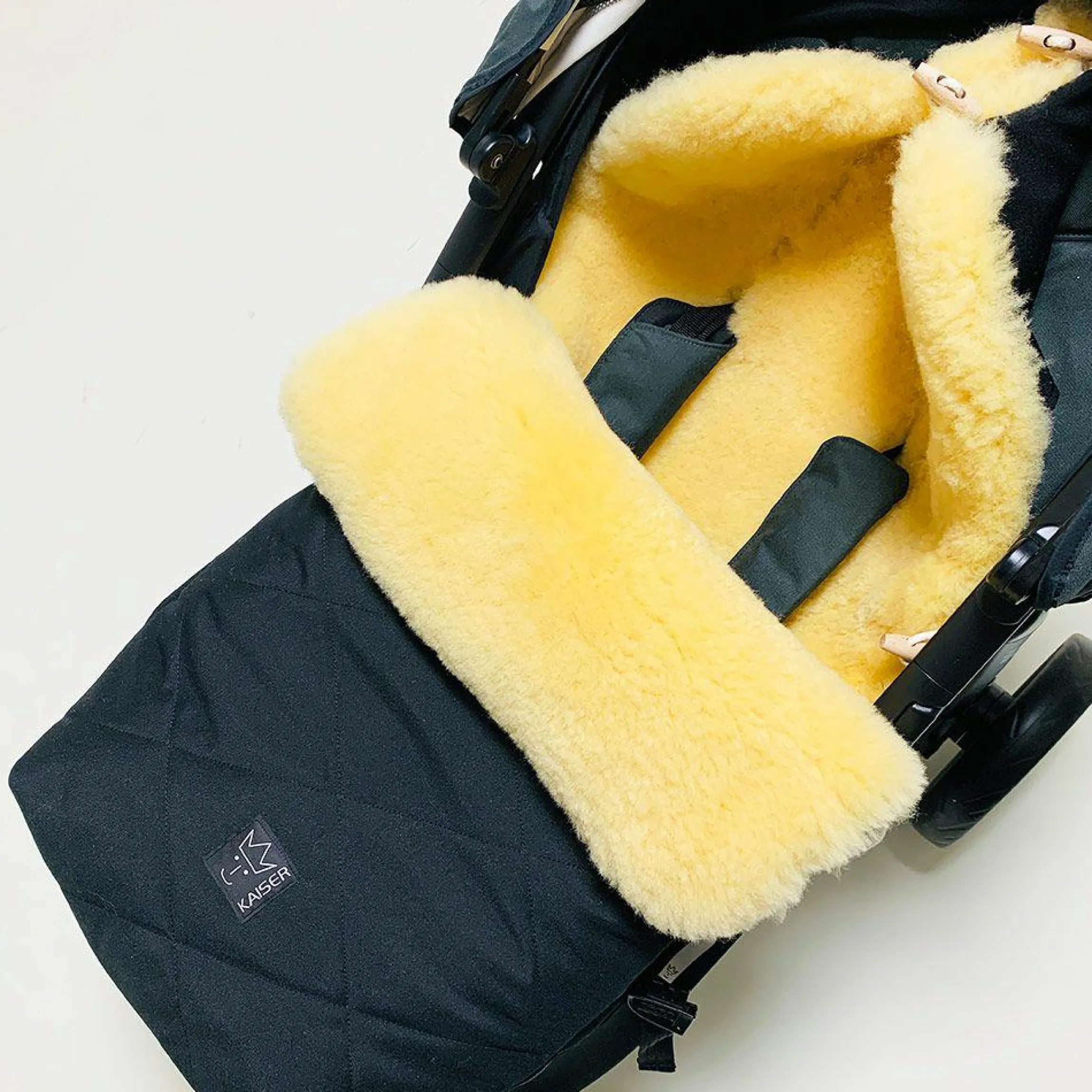 Lammfell-Fußsack Natura II für Joie-Kinderwagen - Schwarz